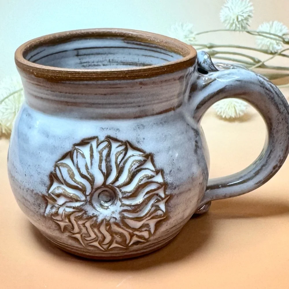 Artist Signed Wheel Spun Pottery mug. Handmade custom piece